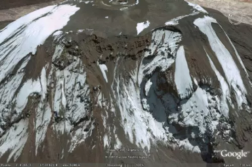 Satellite view of Kilimanjaro's Western Breach showing crater and snow cover from above